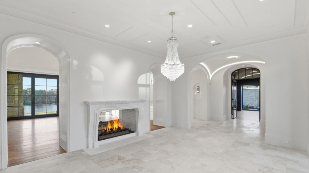 Interior gas fireplace in a custom home, providing supplemental heat during cold weather and power outages.