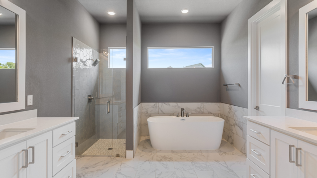 Master bath inside a residential garage wall for controlling water supply during emergencies.