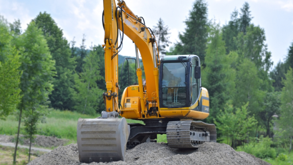 Tractor on big pile of dirt to indicate construction jobs available.