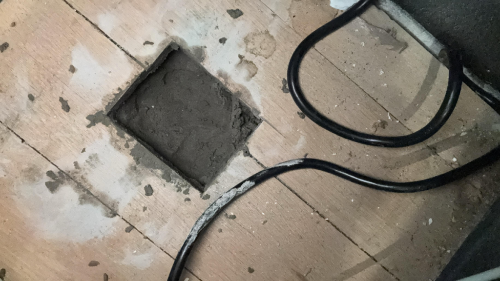 Floor drain concreted in to avoid pests from coming in.